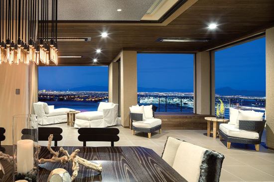 Builder Josh Anderson insisted on changes to the floor plan that optimized vistas of the city below. One of the best vantage points is from the dining room and its adjacent terrace, where disappearing Sierra Pacific doors slide into wall pockets to open up an entire corner of the room.
