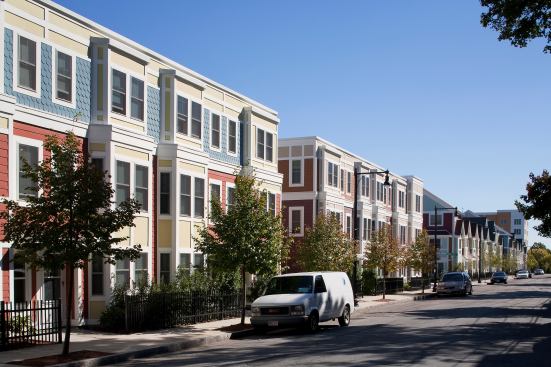 A multicolored palate helps this mix of buildings stay coherent.; The homes meld with each other; as well as with the weave of the city.; 
Project: Franklin Hill; Dorchester; Mass.; Architect: DHK 
Architects; Boston; 
Builder: CWC Builders; Newton; Mass.