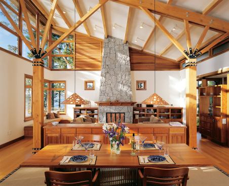 Fresh air and light stream in through the clerestories on the home’s west side. A massive granite fireplace anchors the living room.