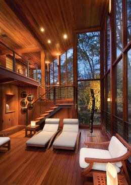 The project's polished materials and detailing lend it a much greater level of refinement than a typical screened-in porch.