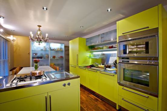 The cabinets are Arclinea "Papaya Giallo" in laminate. "The clients saw the color in a showroom and loved it," says designer Lisa Wilson-Wirth of Arclinea San Diego. They ditched their traditional kitchen design and started over.