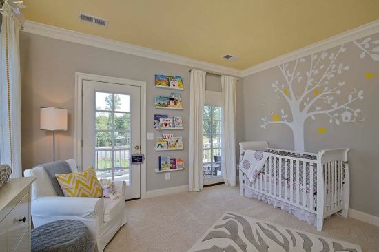 A secondary bedroom at one of Integrity’s models at Willowsford.