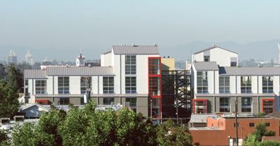 The developers of GreenCity Lofts had the unenviable task of dealing with two different zoning jurisdictions to get the project built, but the hard work was well worth it. The 62-unit project now stands as one of the greenest multifamily projects in the San Francisco Bay area. Located in a predominantly industrial neighborhood that is transitioning to residential, the site straddles the dividing line between Oakland and Emeryville, Calif. This context —along with a strong commitment to sustainability—became integral to many of the design decisions.