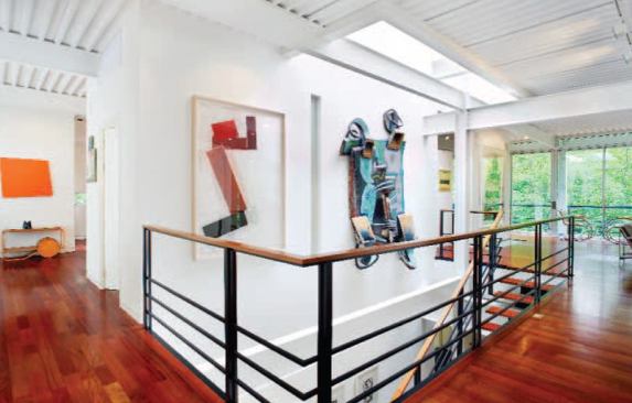 The exposed steel frame helps to define interior space as well.