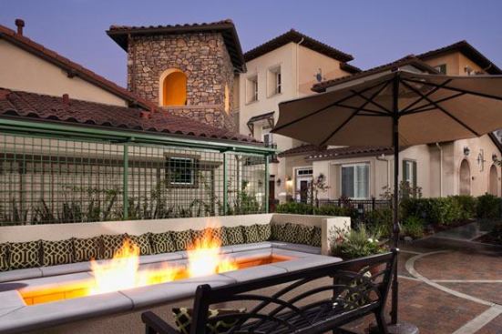 There’s plenty of seating area at this fire pit, located in a mixed-income development of townhouses and low-rises. Architect: KTGY Group; Builder: O'Brien Homes/Sunnyvale Associates; Land Planner: KTGY Group