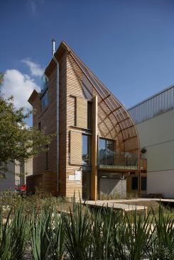 The Lighthouse by Potton is a SIP-built timber-frame demonstration home in the United Kingdom featuring a variety of green technologies. The list includes a biomass boiler, photovoltaics, solar-thermal array, and a heat recovery system. Utility costs are estimated to be around 30 euros a month.