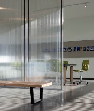 A detail of the polycarbonate divider (from Polygal) and sliding door.