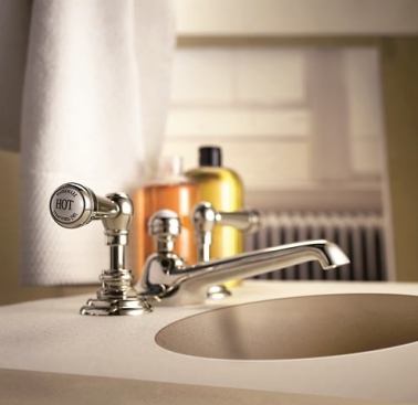 The Stratford line of bath fittings has a classic yet clean appearance that will fit right into all but the most contemporary architectural styles.  Shown with Preston handles, the widespread unit measures 7 inches and is shown in polished chrome. 
www.watermark-designs.com.