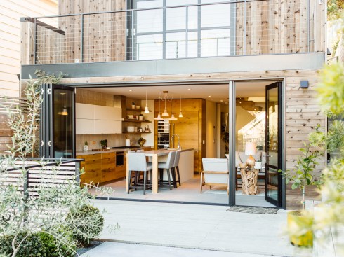 window filled facade with indoor outdoor connections