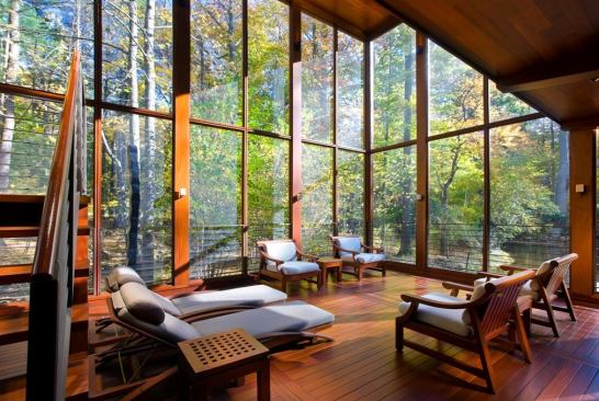 The ground floor of the main porch provides expansive views of nature.