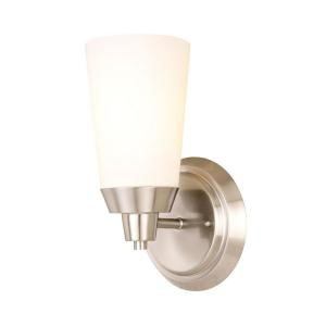 The Stratus single-light sconce from Hampton Bay, The Home Depot’s house brand, offers an inoffensive design and a very attractive price—$16.50. Made from steel and featuring a brushed nickel finish, it comes with an energy-efficient GU24 compact fluorescent bulb and can be used as an up- or down-light. www.homedepot.com.