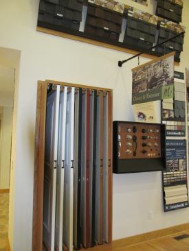 Customers visiting the design center are presented with options for doors, exteriors, roofing, siding, and faucets. IBS is in the process of redoing the brochures for its 88 house plans.