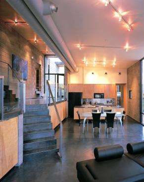 Operable windows and punkah louvers distribute fresh air throughout the main living space.