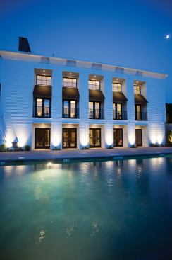 The clubhouse and pool are reminiscent of a luxury resort.