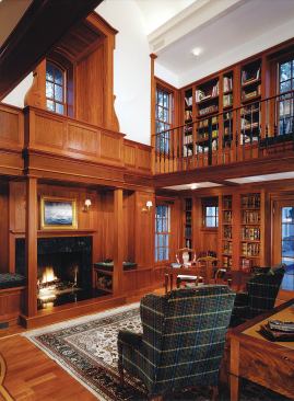 Custom Home, November-December 2004  Custom Touches  Barnes Vanze Architects, Washington, D.C.   A mezzanine level adds more storage space for books in this Brazilian cherry-lined library—and it helps humanize the scale of the room’s 25-foot-high ceilings.