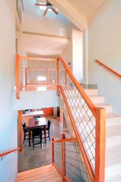 A reflective light well over the staircase brings abundant light into the interiors and automatic light switches help save energy.