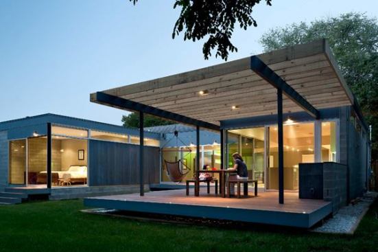 Rectilinear additions jut out from the original building to create a semi-enclosed courtyard.