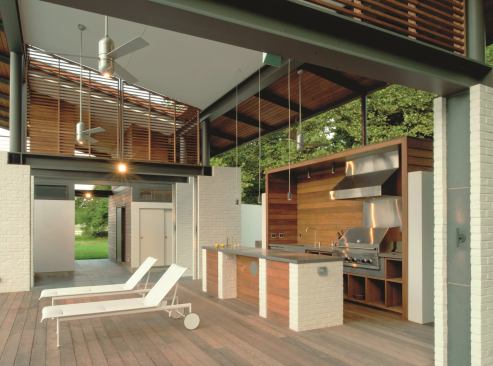 This versatile pool house is adaptable enough to change with the seasons, offering a full residence in warm weather, a guest home all year, and a pool house in summer months. An existing stone wall was used to separate the structure’s conditioned spaces—a bedroom and bathroom—from public areas, which open wide to welcome in fresh breezes. Project: Rappahannock Bend Summer House, King George, Va.; Builder: Bonitt Builders, Alexandria, Va.; Architect: McInturff Architects, Bethesda, Md.