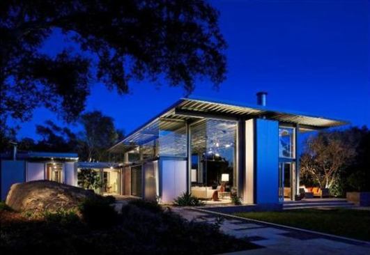 Dramatic 13-foot walls of floor-to-ceiling glass lend an ultra-hip vibe to this Southern California home and offer unhindered views of the Santa Ynez Mountains. Project: Ladera Residence, Montecito, Calif.; Architect: Barton Myers Associates, Los Angeles; Builder: Caputo Construction, Los Angeles