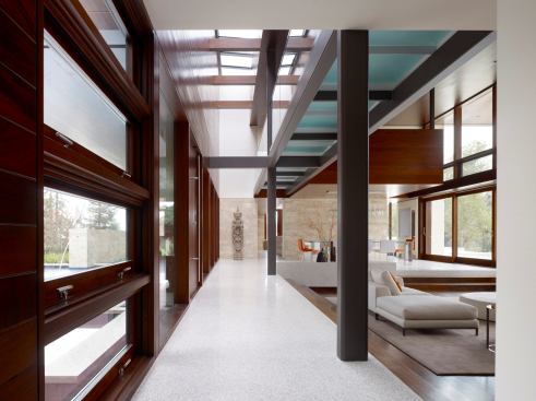 Grand, Custom Home 8,001 to 12,000 square feet. Builder: Lencioni Construction. Architect: Swatt | Miers Architects. The open planning and strong indoor-outdoor connections give a vacation-house feel to this primary residence.