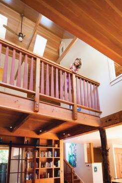 High windows create a chimney effect. The house's many operable windows eliminate the need for air conditioning. When it is too hot or cold to open windows, a Venmar HRV provides tempered fresh air to each room and exhausts air from the kitchen and baths.