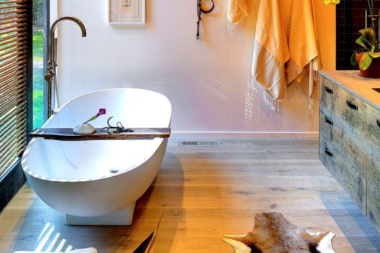 The master bath for Robin's Way was inspired by the homeowners' collection of interesting artifacts accumulated over years of travel.