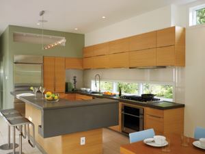 The kitchen contains a folded countertop of engineered quartz.