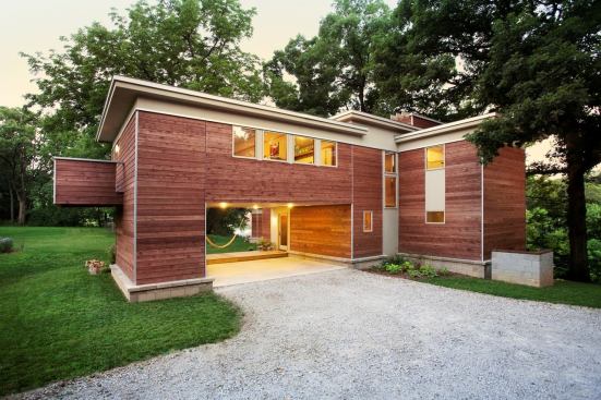 Wood helps this home, titled Äkta Linjen (Swedish for “Authentic Lines”), meld with the trees that shade it. Location: Siloam Springs, Ark.; Architect: Matthias Pearson