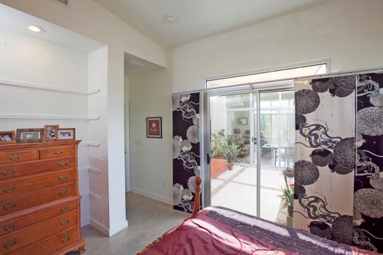 A view from the master bedroom to the main courtyard.