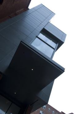 The exterior is clad in Rheinzink panels, which resemble slate as it ages. The judges felt it was brave to put this kind of material over brick.