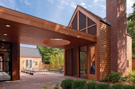 This covered walkway’s warm wood complements the main home’s cedar shingles and is extended onto the adjoining outbuilding’s fa&ccedil;ade, which connects the two structures without disrupting the original historic structure. Project: 308 Mulberry, Lewes, Del.; Architect: Robert M. Gurney, Washington, D.C.; Builder: Ilex Construction, Easton, Md.