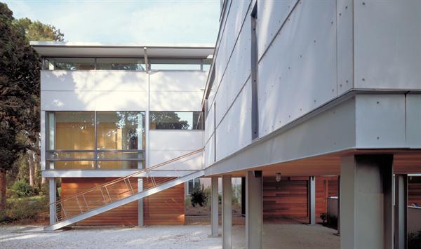 A shallowpitched entry stair takes its cue from a typical dock ramp.