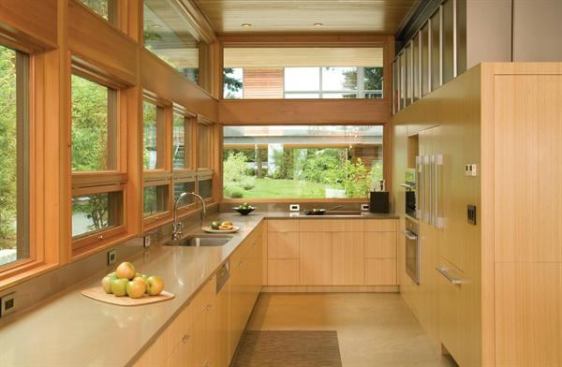 Wood windows topped by dormers of the same material enhance the natural vibe in this LEED-Platinum home, while triple-pane glass boosts its performance. Project: The Ellis Residence, Bainbridge Island, Wash.; Architect: Coates Design Architects, Bainbridge Island; Builder: Smallwood Design and Construction, Bainbridge Island