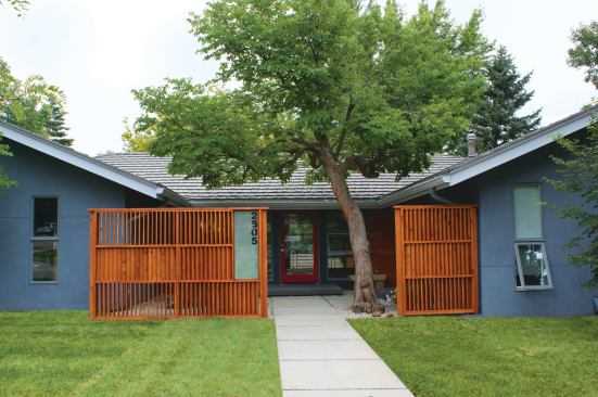 This sliding barn-door entry, made of slats of Western Cedar, provides privacy and access to street views and sunlight. Project: Cragmoor Residence, Boulder, Colo.; Architect: Arch11, Boulder; Builder: Buckner Construction, Boulder
