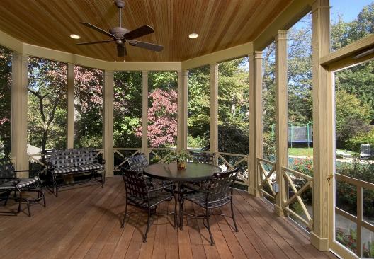 From the interior, the sunroom has a sweeping view of the yard. Sun Design, www.sundesigninc.com, McLean, Va.