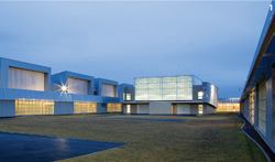 Union County Juvenile Detention Center, Elizabeth, N.J.: Ricci Greene Associates' 70,000-square-foot juvenile facility, which houses 80 boys and girls, wraps around nearly an acre of outdoor recreation space and brings in ample natural light.