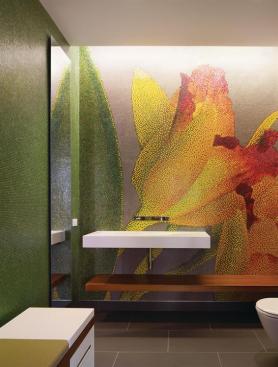 The powder room wall features a pixilated photo of the client's favorite orchid, rendered in ceramic tile. 
