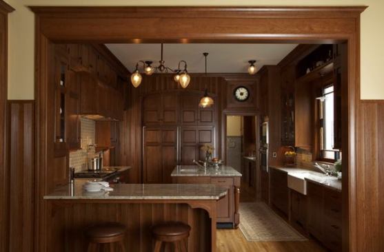 The kitchen countertops are surf green granite. Architect David Heide designed the cabinets for the kitchen and bathroom.