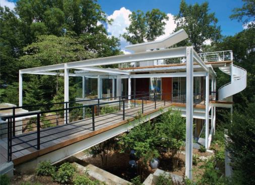This remodel of a mid-century Modernist house sacrificed space within its steel frame to create covered decks and define outdoor space.