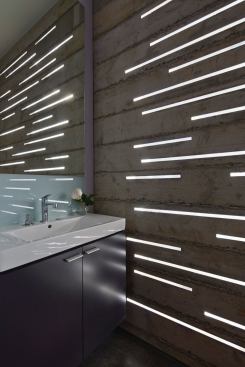 2014 Grand, Powder Room: Crook Cup Bow Twist by Schwartz and Architecture Step inside the powder room during the day and you’ll be dazzled by a play of light and shadow. The acrylic captures the southern sun while concrete keeps the space cool.