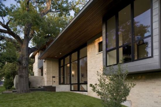 This new construction utilized materials and scale to blend a modern home into its Old Enfield neighborhood and received a 5-star Green Building Rating.