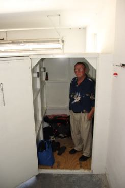 Two-time tornado survivor Tom Cook in his Twister Safe shelter in a neighborhood in Joplin, MIssouri. Tom and his daughter Ryanne sheltered in the unit during the tornado; their house was destroyed. The unit survived with no damage and was reinstalled in the garage of the Cooks’ current house.