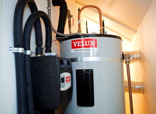 The solar hot water system provides up to 70 percent of residents' hot water needs. Electric power helps supplement demand.