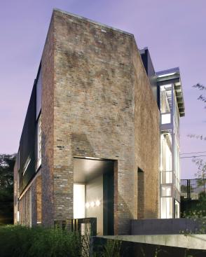 The triangular-shaped form posed challenges, but the design team transformed it into a home for a family of four in Chicago�s Bucktown neighborhood. 