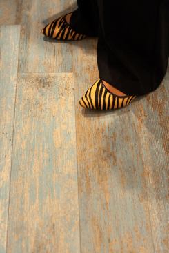 Ceramic tiles printed to simulate wood continues to trend in the world of tile. Vives's porcelain tile collection Faro assumes the look of painted, distressed wood.