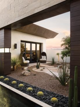 There are many outdoor areas that are easily accessible from different parts of the house.