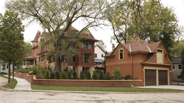The deteriorated rear of the house, a 20-foot section, was replaced with a three-and-a-half-story addition encompassing a master suite on the second floor and, on the first, a new kitchen, family room, breakfast room, side porch, and butlery, as well as a relocated powder room.