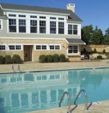 Yes, the two-building compound is the nexus for recreational activities—on the grounds are two swimming pools and two tennis courts—but it's also the gathering place for members of some 20 organized clubs.