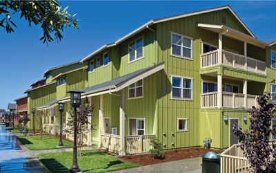 Until recently, migrant and resident farm workers in Pajaro, Calif., had no choice but to live in sub-standard, one-story units that often flooded. While many residents were temporarily housed in trailers, KTGY Group and South County Housing replaced the deficient housing stock with 63 two-story homes, each eaturing living spaces that are elevated above the flood plain.