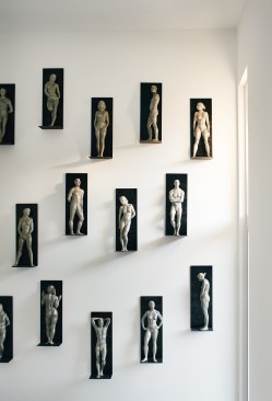 Stairwell wall with Christopher Smith's "Perfectly Naked" Series